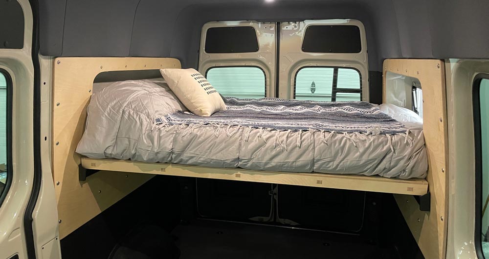 Sprinter interior with Flarespace bed system fitting below stock headliner